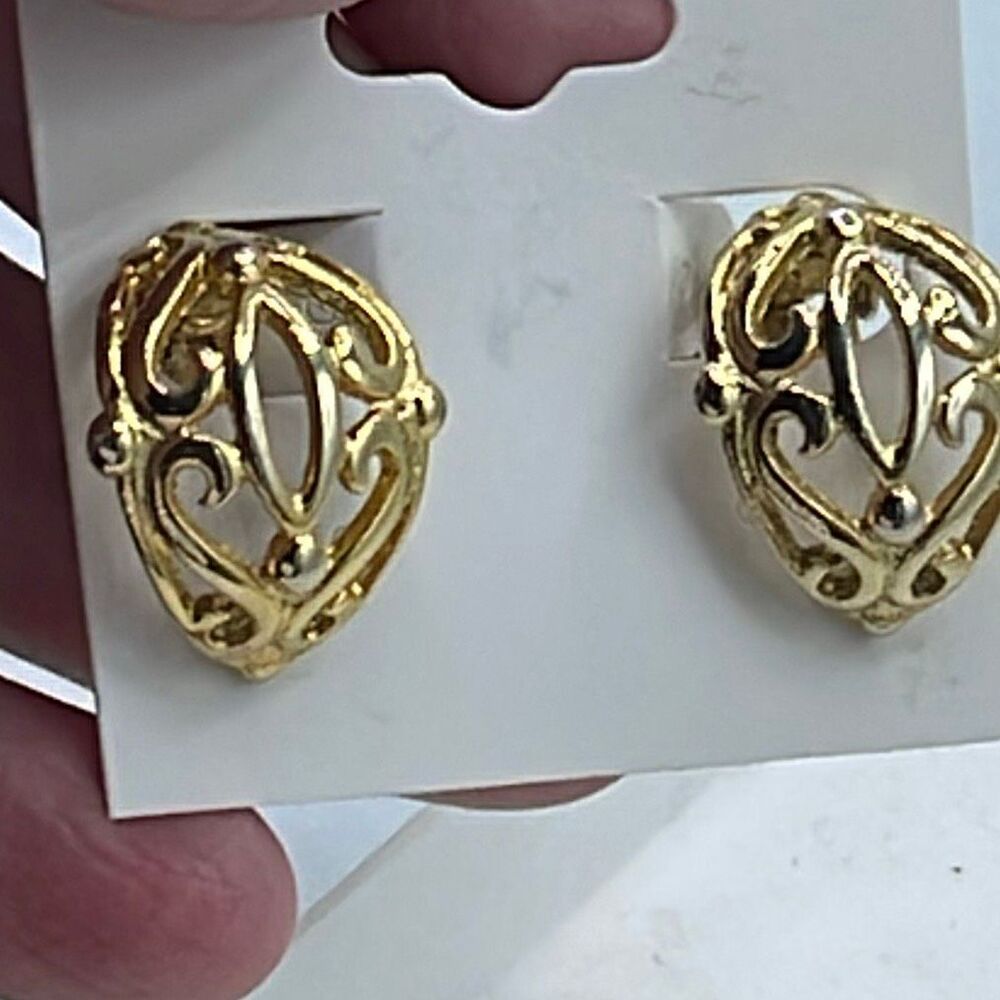 Vintage open cut ornate design clip earrings.